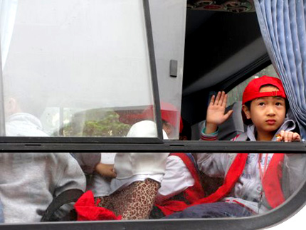 One of a large group of schoolkids heading out on an earthquake field trip from Chengdu, China. Photo: Melissa Block, NPR.