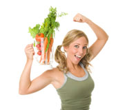 blonde woman holds bowl of veggies