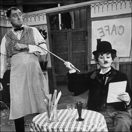 Lucy Ricardo (Lucille Ball) impersonates Charlie Chaplin's Little Tramp