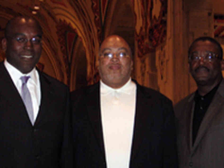 Three businessmen betting on Detroit Three businessmen betting on Detroit