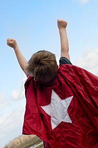A child in a superhero costume