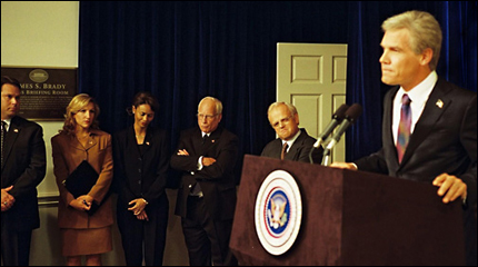 Josh Brolin, as George W. Bush, holds a press conference