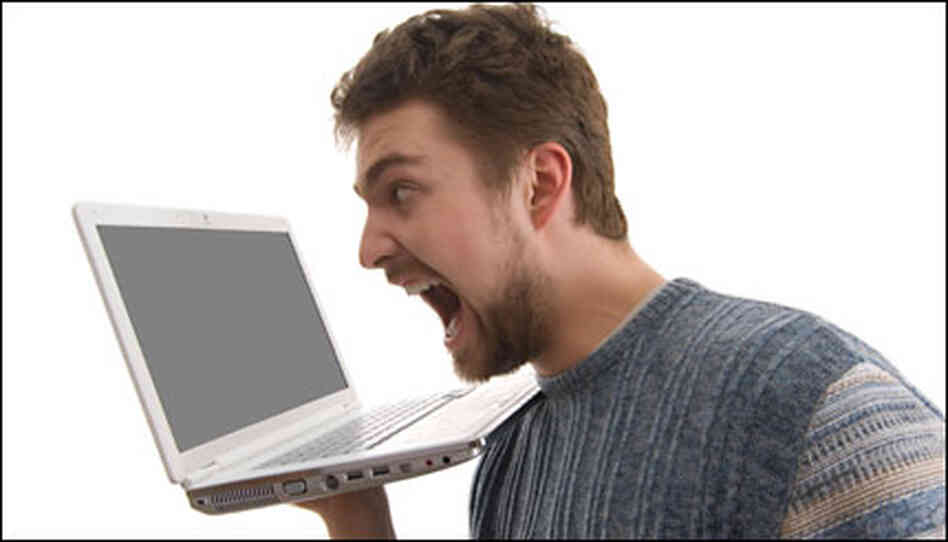 man yelling at his computer man yelling at his computer