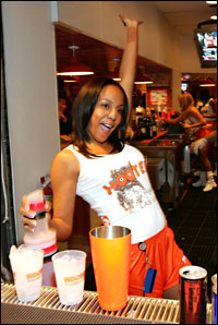 A Hooters waitress at a 2006 restaurant opening