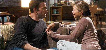 Ben Affleck and Jennifer Aniston on sofa