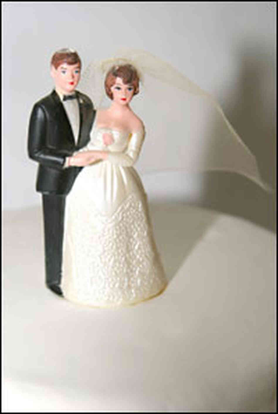 Bride and groom figurines from a wedding cake Bride and groom figurines from a wedding cake