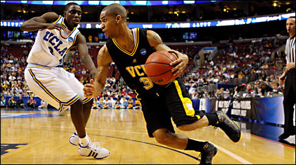 Virginia Commonwealth's Eric Maynor drives on UCLA's Darren Collison