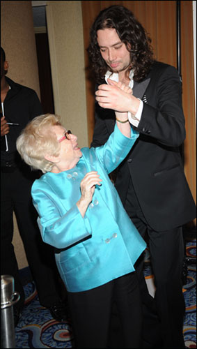 Constantine Maroulis kissing the hand of Dr. Ruth Westheimer