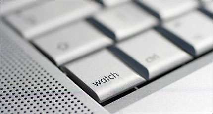 computer keyboard with 'watch' button
