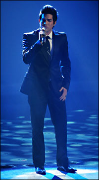 Adam Lambert singing on April 21