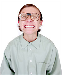 a very happy man in glasses