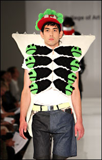 Fashion with smiley faces at the Royal College Of Art Summer Fashion Show in London