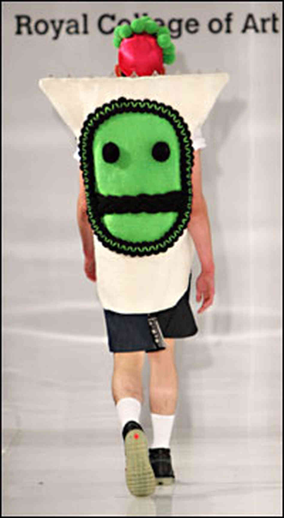 Fashion with smiley faces at the Royal College Of Art Summer Fashion Show in London Fashion with smiley faces at the Royal College Of Art Summer Fashion Show in London