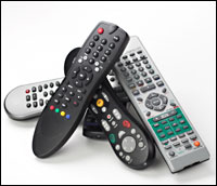a stack of remote controls