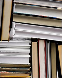 a crowded shelf of books