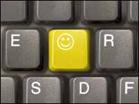 Computer keyboard with a happy-face key
