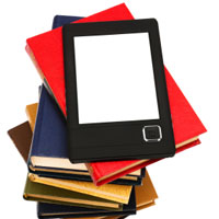 a stack of books with an electronic reader on top.
