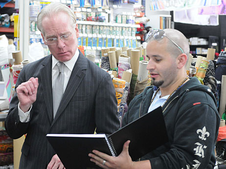 Tim Gunn looks disapprovingly at a contestant's fabric choices on 'Project Runway.'