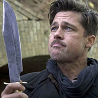 Brad Pitt holds up a knife in Inglourious Basterds.