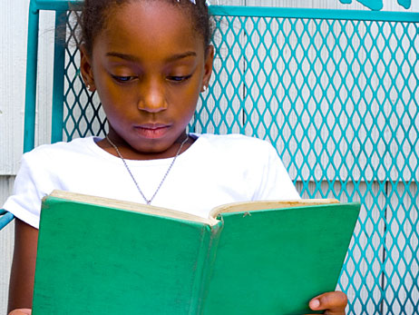 A child reading a book.