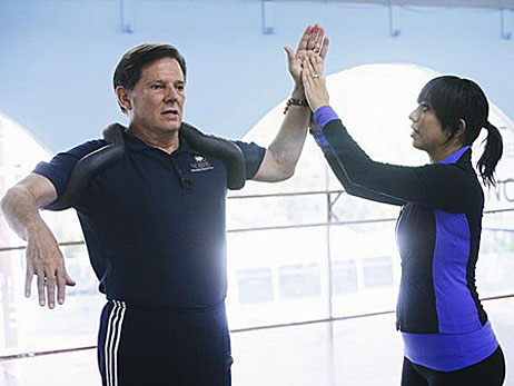 Tom DeLay and Cheryl Burke practice for <em>Dancing With The Stars</em>.