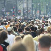 A crowd of people facing away from the camera.