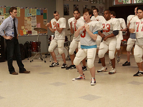 Kurt (Chris Colfer) teaches the football team to dance on Fox's 'Glee.'