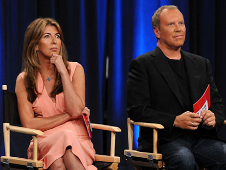 Nina Garcia and Michael Kors in their judges' chairs on Project Runway.