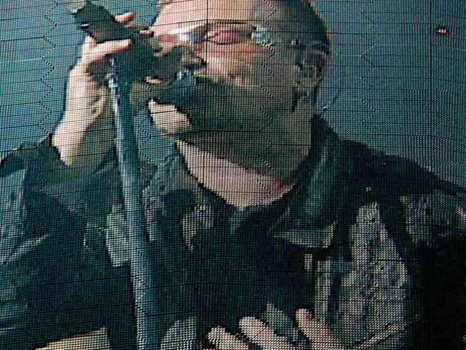 U2 Frontman Bono on the Cowboy Stadium GinormoTron. U2 Frontman Bono on the Cowboy Stadium GinormoTron.