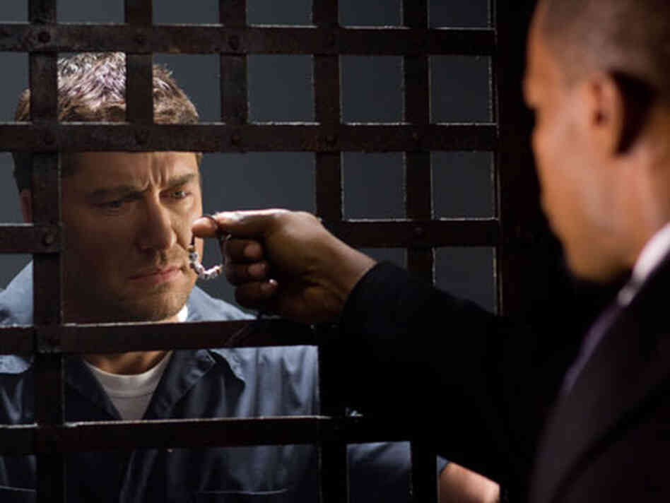 Gerard Butler and Jamie Foxx in Law Abiding Citizen. Gerard Butler and Jamie Foxx in Law Abiding Citizen.