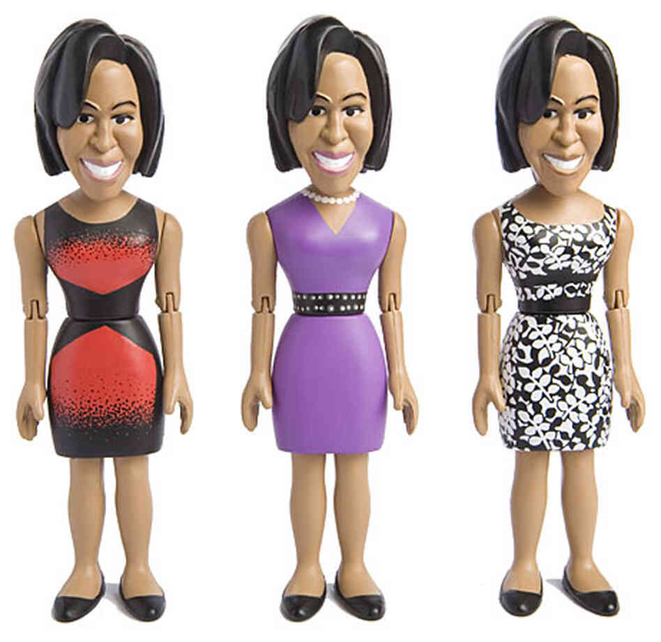 Three versions of the Michelle Obama action figure. Three versions of the Michelle Obama action figure.