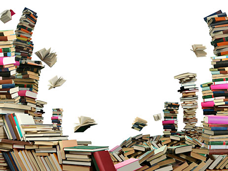 Giant stacks of books, some falling down.