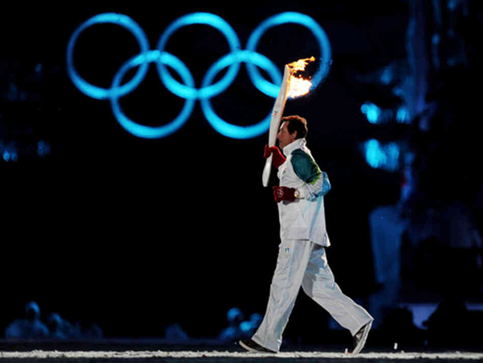 Wayne Gretzky carries the Olympic torch at the opening ceremonies on Friday, January 12. Wayne Gretzky carries the Olympic torch at the opening ceremonies on Friday, January 12.