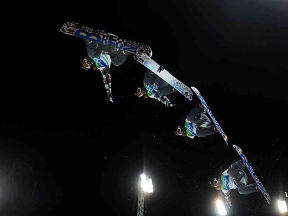 Shaun White performs at the 2010 Winter Olympics and is shown in multiple exposures. Shaun White performs at the 2010 Winter Olympics and is shown in multiple exposures.