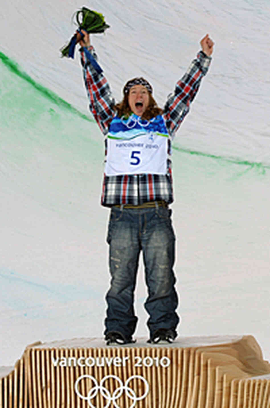 Shaun White celebrates his snowboarding gold medal. Shaun White celebrates his snowboarding gold medal.