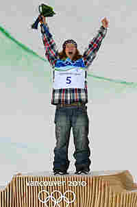Shaun White celebrates his snowboarding gold medal. Shaun White celebrates his snowboarding gold medal.