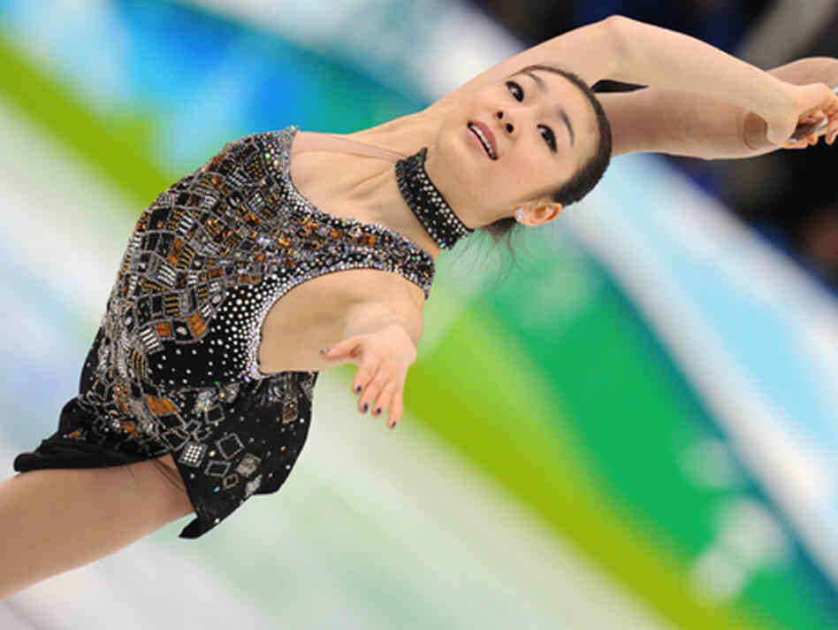 Kim Yu-Na performs her short program at the 2010 Winter Olympics. Kim Yu-Na performs her short program at the 2010 Winter Olympics.