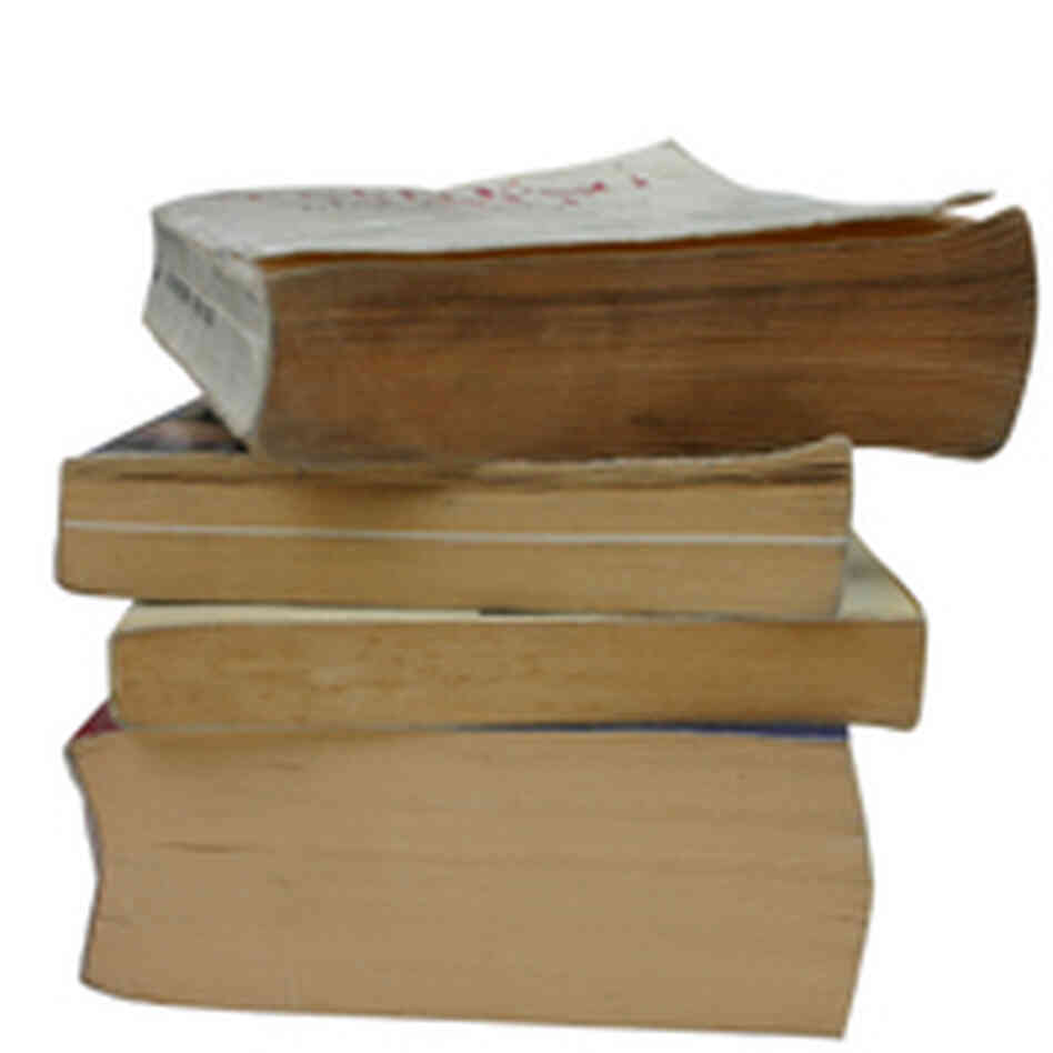 a pile of old paperback books. a pile of old paperback books.