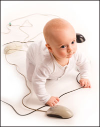 A baby plays with mouse cords. Photo by Ksenia Kozlovskaya/iStockphoto.