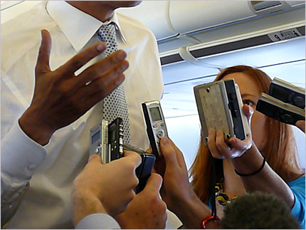Sen. Barack Obama talks on his campaign plane.