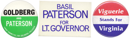 Campaign buttons for Goldberg, Paterson and Viguerie.