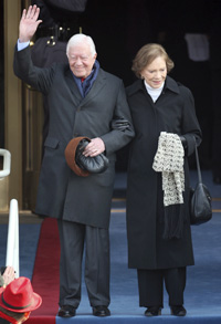 Former President Jimmy Carter and wife, Rosalynn, arrive at the U.S. Capitol in Washington, Tuesday, Jan. 20, 2009, for the swearing-in of President-elect Barack Obama and Vice President-elect Joe Biden. AP Photo/Ron Edmonds.