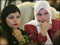 Iraqi women attend a press conference in Baghdad, August 3, 2005.