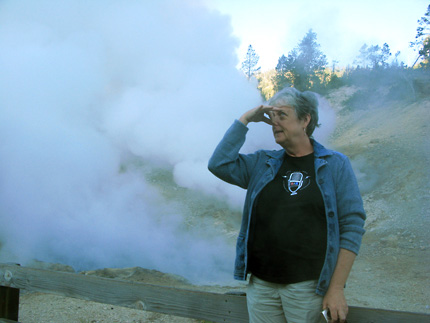 Liane Hansen reacts to the smell of sulfur coming out of the ground.
