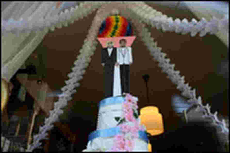 A mock wedding cake with two grooms on display in San Francisco. A mock wedding cake with two grooms on display in San Francisco.