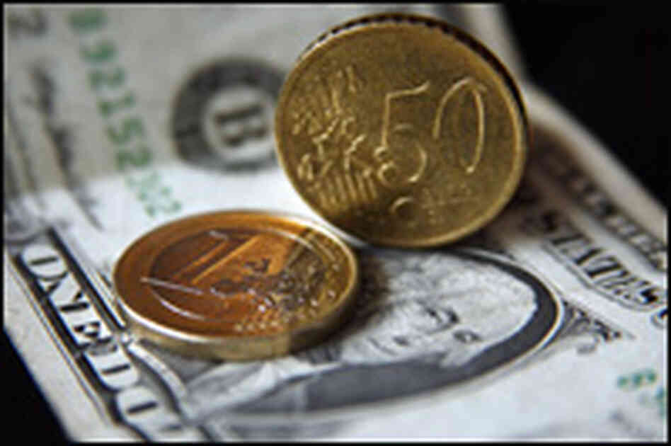 The euro is literally and figuratively on top of the dollar. (The dollar plunged to a new record low The euro is literally and figuratively on top of the dollar. (The dollar plunged to a new record low