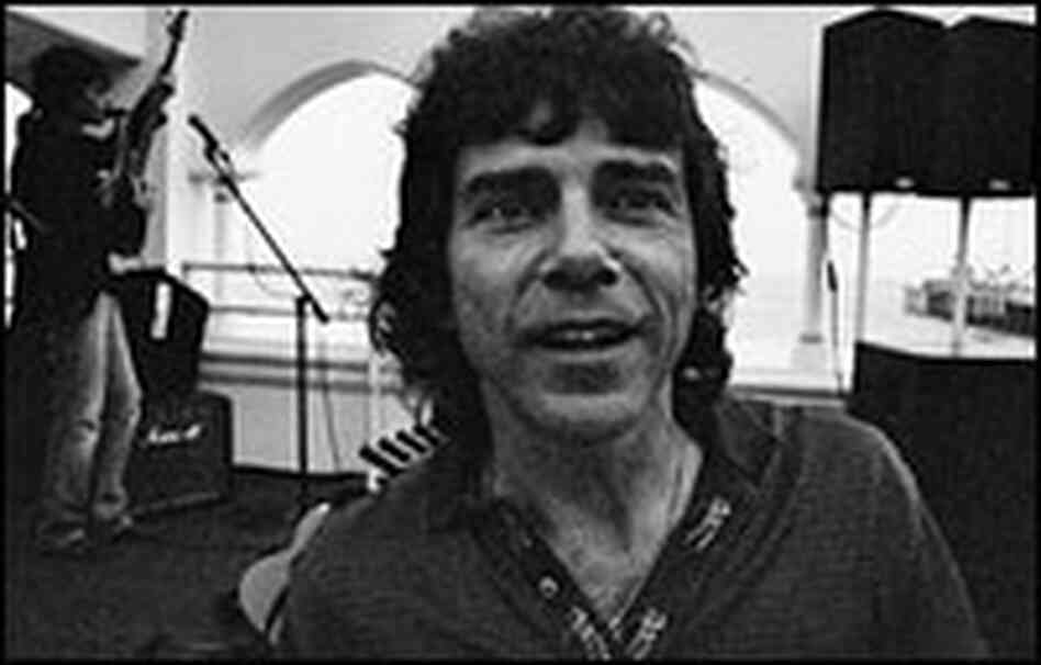 Glen Carroll, dressed casually in a golf shirt, before a gig. Soon he'll be dancing and prancing lik Glen Carroll, dressed casually in a golf shirt, before a gig. Soon he'll be dancing and prancing lik