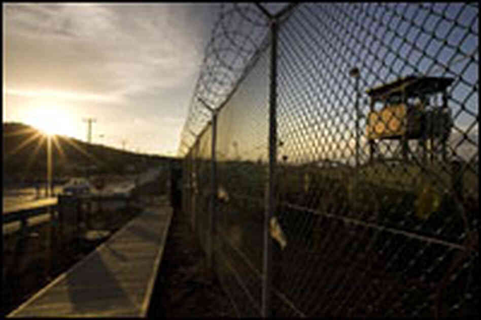 (EDITORS NOTE: THIS IMAGE WAS REVIEWED BY U.S. MILITARY) The sun rises over Camp Delta detention com (EDITORS NOTE: THIS IMAGE WAS REVIEWED BY U.S. MILITARY) The sun rises over Camp Delta detention com