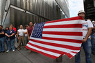 New Yorkers remember the victims of 9/11. New Yorkers remember the victims of 9/11.