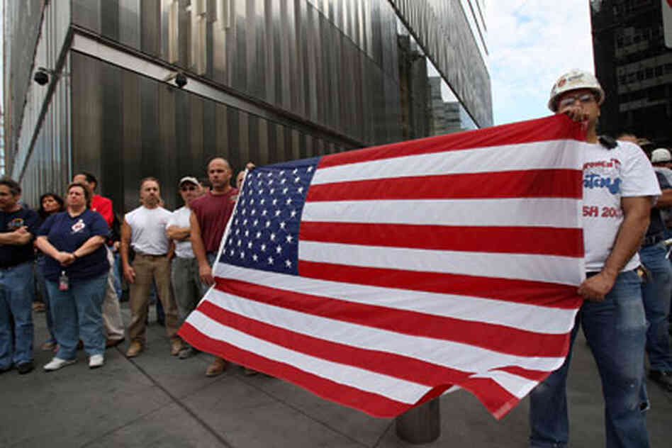 New Yorkers remember the victims of 9/11. New Yorkers remember the victims of 9/11.